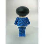 Vinyl art toy of a man in blue clothes holding a sign Vinyl art toy of a man in blue clothes holding a sign