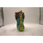 a kaiju sofubi of mexico green drogan 