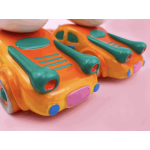 a sofubi panda with car a sofubi panda with car