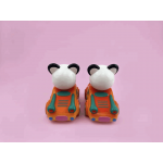 a sofubi panda with car a sofubi panda with car