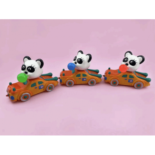 a sofubi panda with car a sofubi panda with car