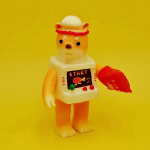 a sofubi yellow cat a sofubi yellow cat