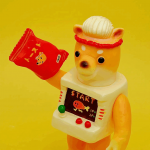 a sofubi yellow cat a sofubi yellow cat