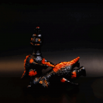 a kaiju sofubi of the gun monster