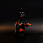 a kaiju sofubi of the gun monster