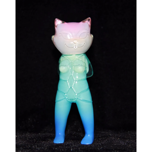 a clear  with multi color sofubi toy