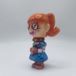 a cute multi color girl sofubi toy a cute multi color girl sofubi toy
