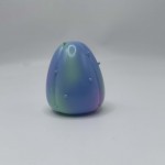 a blue cactus monster sofubi